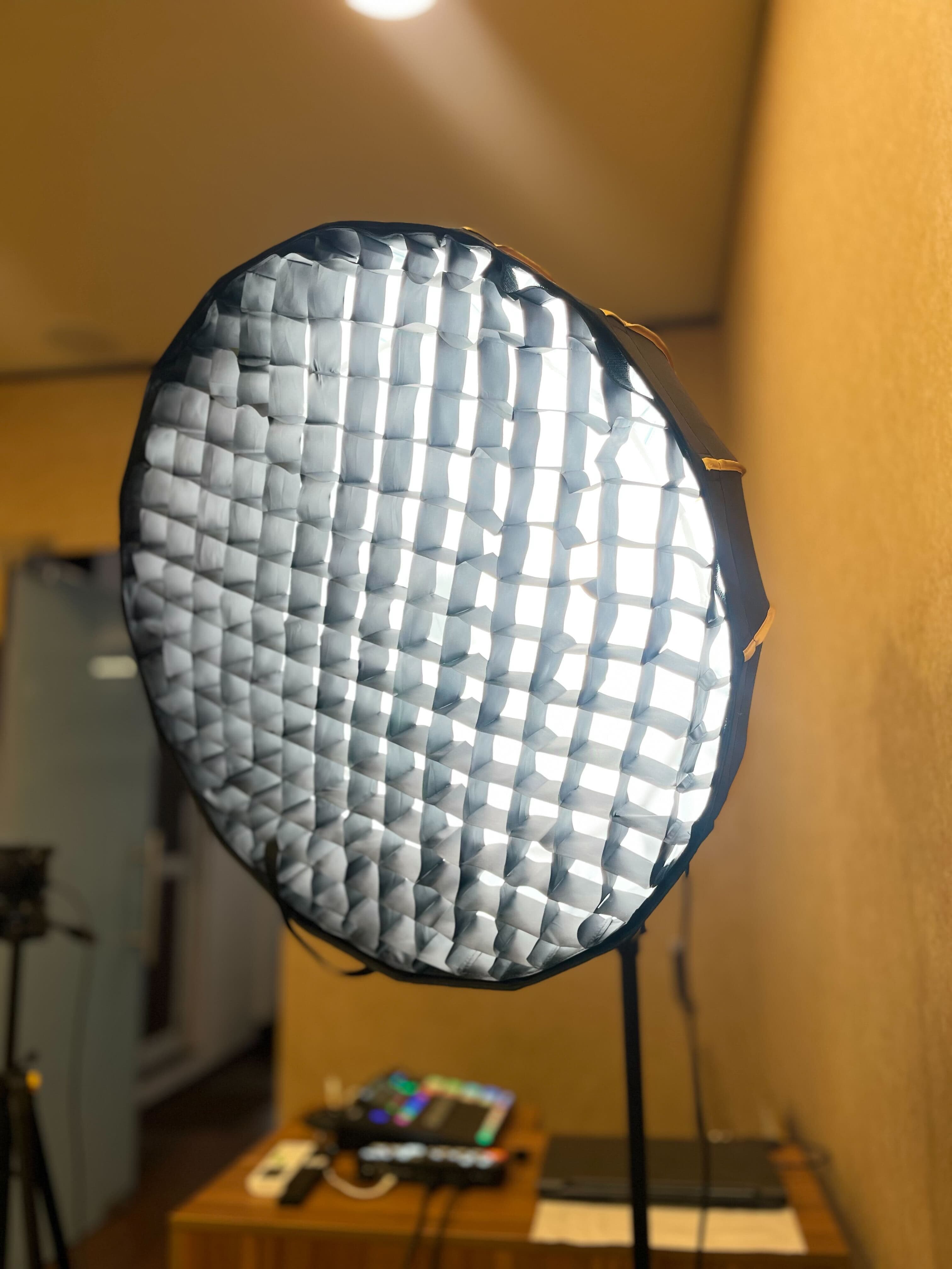 Beauty Box softbox lighting with RODECaster console in podcast studio